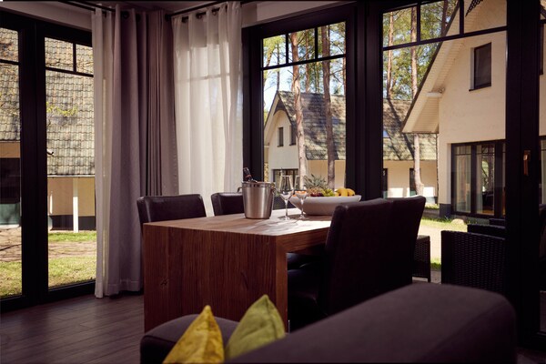 Foto van Twee-onder-een-kapwoningen in het natuurresort Drewitz - LivingRoom