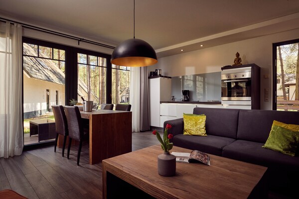 Foto van Twee-onder-een-kapwoningen in het natuurresort Drewitz - LivingRoom