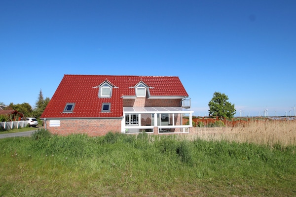 Foto van Vakantiehuis met drie badkamers in Dornumersiel - Vakantiehuis in Dornumersiel - ExteriorSummer
