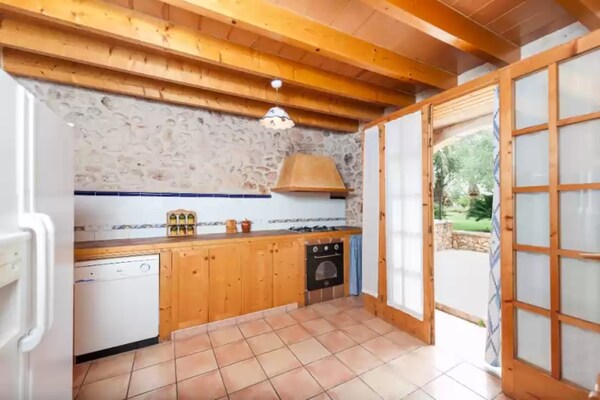Foto van Villa in Inca met zwembad en boomgaard - Vakantiehuis in Inca, Illes Balears - Kitchen