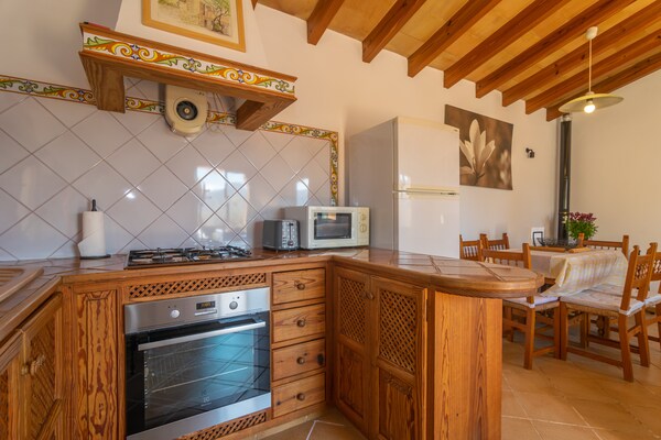 Foto van Sfeervol Huis in Fornalutx met Uitzicht - Vakantiehuis in Fornalutx, Illes Balears - Kitchen