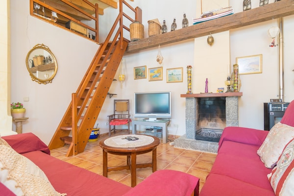 Foto van Villa in Binissalem met Zoutwaterzwembad - Vakantiehuis in Binissalem, Illes Balears - LivingRoom