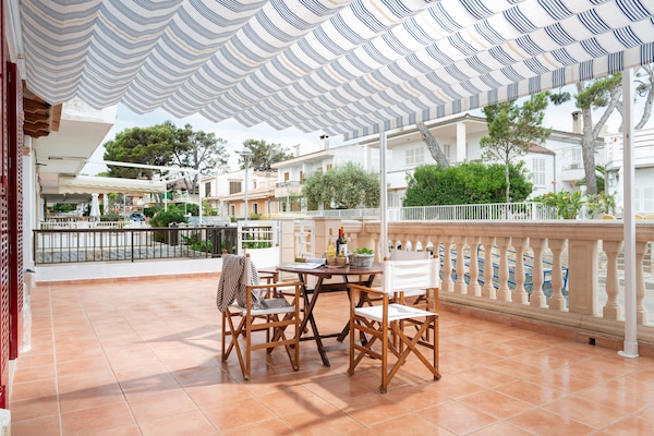 Foto van Huis in Can Picafort bij het Strand - Vakantiehuis in Can Picafort, Illes Balears - TerraceBalcony