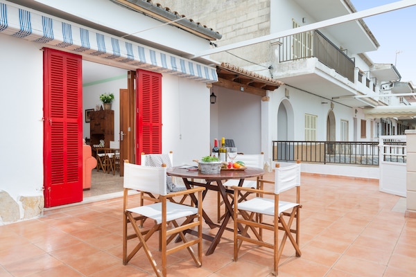 Foto van Huis in Can Picafort bij het Strand - Vakantiehuis in Can Picafort, Illes Balears - TerraceBalcony