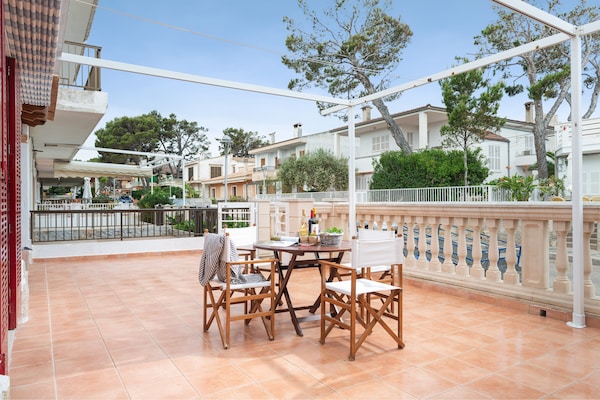 Foto van Huis in Can Picafort bij het Strand - Vakantiehuis in Can Picafort, Illes Balears - TerraceBalcony
