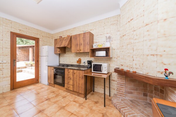 Foto van Villa in Calonge met Zwembad en Uitzicht - Vakantiehuis in S'horta, Illes Balears - Kitchen