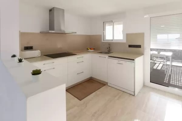 Foto van Modern rijtjeshuis aan zee - Vakantiehuis in Oliva Nova, Valencia - Kitchen
