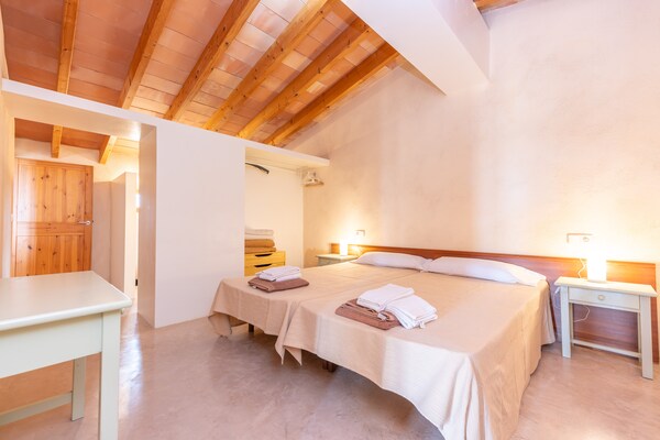 Foto van Villa in Cala Bona met Zwembad & Strand - Vakantiehuis in , Illes Balears - BedRoom
