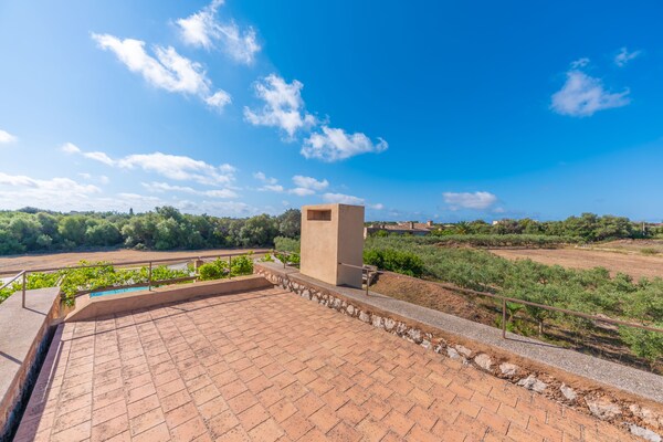 Foto van Villa in Cala Bona met Zwembad & Strand - Vakantiehuis in , Illes Balears - AreaSummer1KM