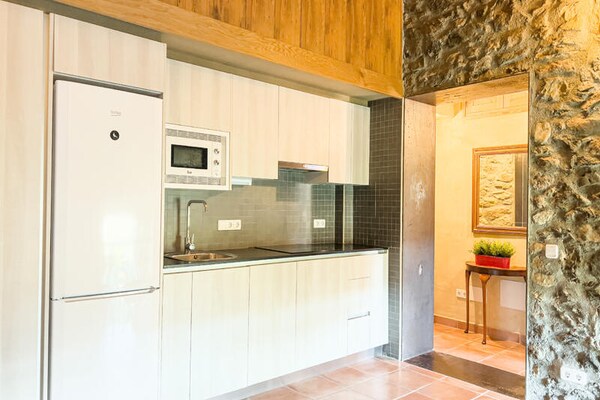 Foto van Appartement in La Garrotxa met uitzicht op het zwembad - Untagged