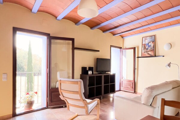 Foto van Appartement in La Garrotxa met uitzicht op het zwembad - Untagged