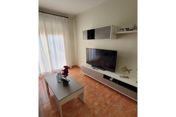 Foto van Appartement een steenworp afstand van het strand - Vakantiehuis in Almeria - LivingRoom