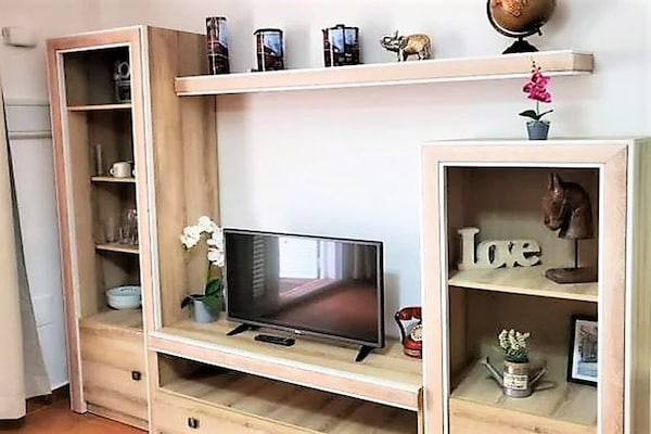 Foto van Duplex in Urb Naturista vlakbij strand en zwembad - Vakantiehuis in Vera Playa - LivingRoom