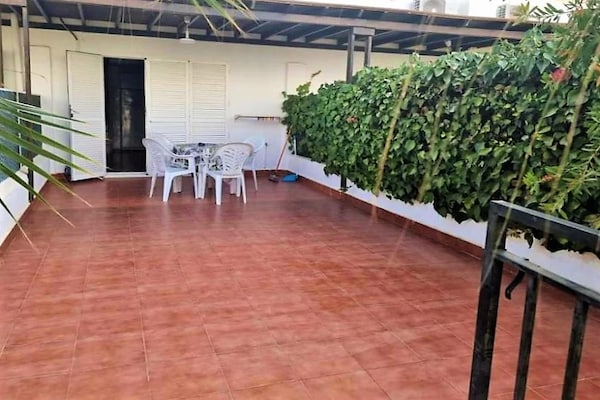 Foto van Duplex in Urb Naturista vlakbij strand en zwembad - Vakantiehuis in Vera Playa - TerraceBalcony