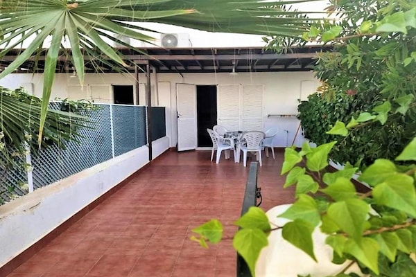 Foto van Duplex in Urb Naturista vlakbij strand en zwembad - Vakantiehuis in Vera Playa - TerraceBalcony