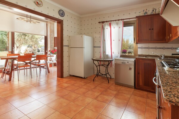 Foto van Huis in Alcudia met zwembad en zeezicht - Vakantiehuis in Alcudia - Kitchen