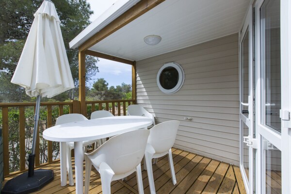Foto van Bungalow met Terras en Parkeerplaats - Vakantiehuis in la Geltrú, Barcelona - TerraceBalcony