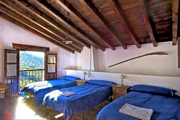 Foto van Landhuis in Andalusië met Zwembad - Vakantiehuis in Andalucía - BedRoom