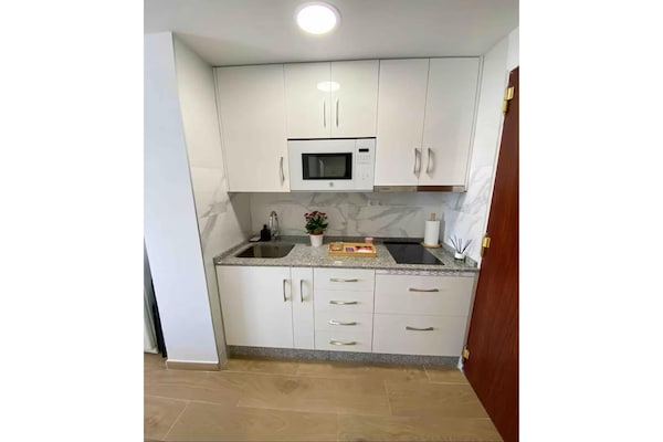 Foto van Appartement met zeezicht in Mijas Costa - Vakantiehuis in Malaga - Kitchen