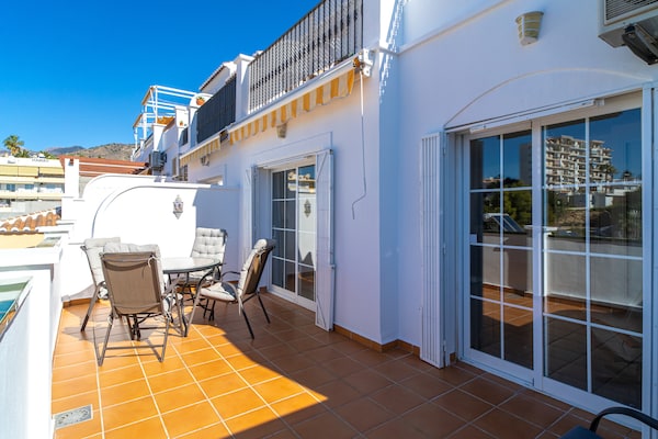 Foto van Appartement in Nerja bij Burriana Strand - Vakantiehuis in Nerja - terrace