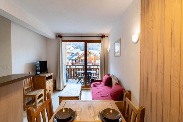 Foto van Residentie Le Balcon Des Airelles - Vakantiehuis in LES ORRES - LivingRoom