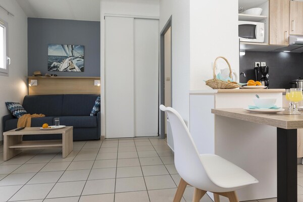 Foto van Moderne gezinsvakantie - Vakantiehuis in Le Chateau d'Oléron - LivingRoom