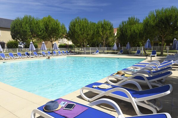 Foto van Appartement in Frankrijk met Uitzicht op Zwembad - Vakantiehuis in Montignac - PoolOfHouse