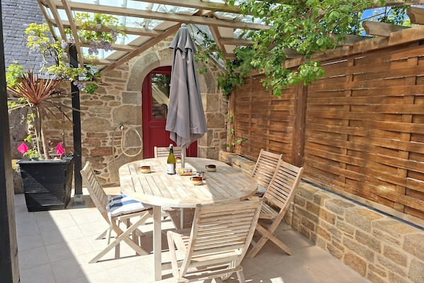 Foto van Bretonse stenen cottage bij zandstranden - Vakantiehuis in Landéda - TerraceBalcony
