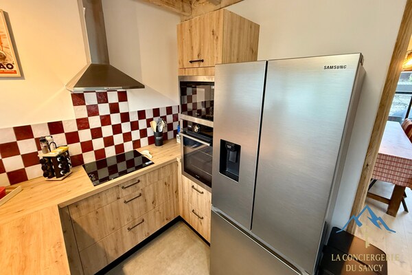 Foto van Chalet met ruim panoramisch terras - Vakantiehuis in Mont-Dore - Kitchen