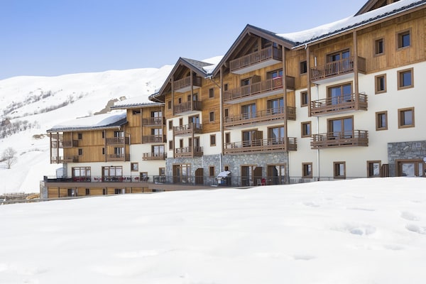 Foto van Appartement op hellingen in Les Menuires - Vakantiehuis in les Menuires - ExteriorWinter