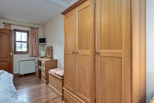 Foto van Cottage bij Cardigan Bay met Bubbelbad - Vakantiehuis in Talybont - BedRoom