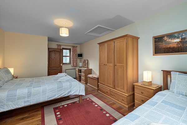 Foto van Cottage bij Cardigan Bay met Bubbelbad - Vakantiehuis in Talybont - BedRoom