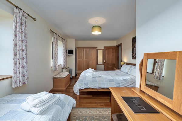 Foto van Cottage bij Cardigan Bay met Bubbelbad - Vakantiehuis in Talybont - BedRoom