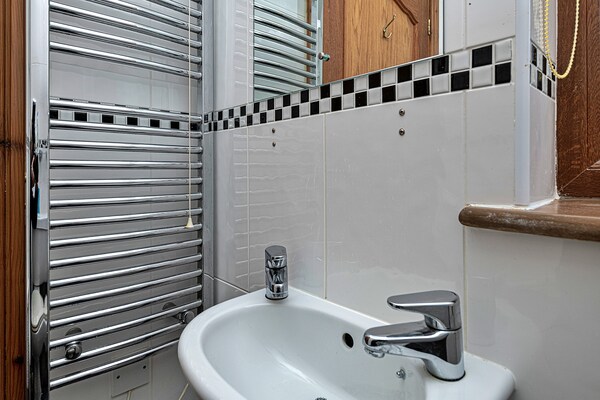 Foto van Cottage bij Cardigan Bay met Bubbelbad - Vakantiehuis in Talybont - BathRoom