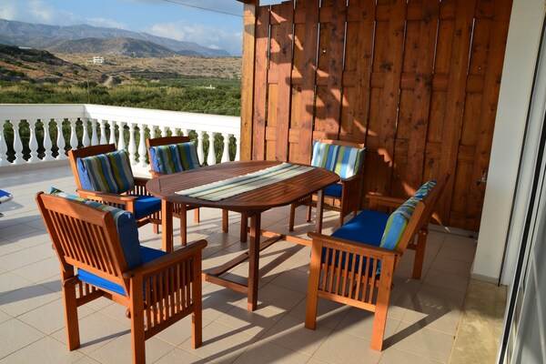 Foto van Villa bij Makry Gialos en zandstrand - Vakantiehuis in Makrigialos - TerraceBalcony