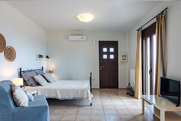 Foto van Studio aan het water in Maroulas - Vakantiehuis in Maroulas - BedRoom