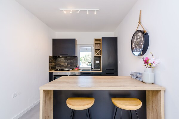 Foto van Apartment Sea Shell - Triplex Three-Bedroom Apartment with Terrace - Kitchen