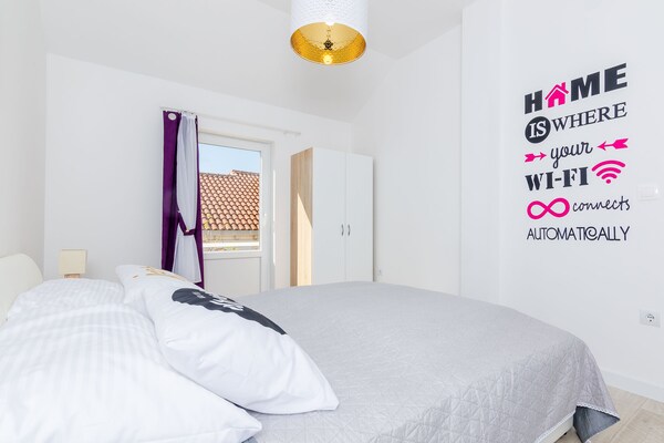 Foto van Apartment Sea Shell - Triplex Three-Bedroom Apartment with Terrace - BedRoom