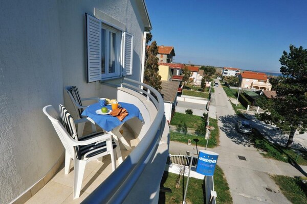 Foto van Apartments Anamarija - One Bedroom Apartment with Balcony - 3 - TerraceBalcony