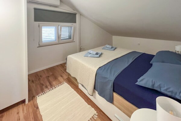 Foto van Holiday Home Aurora - Three bedroom Holiday Home - Vakantiehuis in Splitska - BedRoom