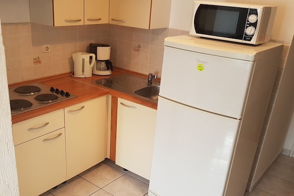 Foto van Apartments Danijela & Vlado - One Bedroom Apartment with Balcony and Garden View - Kitchen