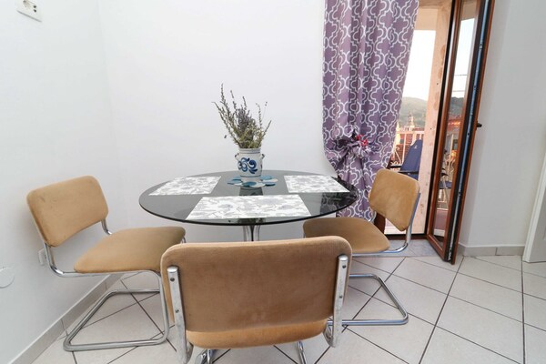 Foto van Fancy Apartments Marco - Superior Studio Apartment with Terrace 4 a - LivingRoom