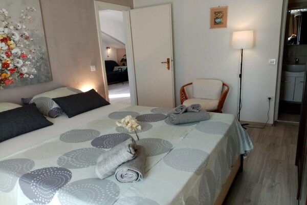 Foto van Apartments Silva - Superior Two Bedroom Apartment with Balcony and Sea View - BedRoom