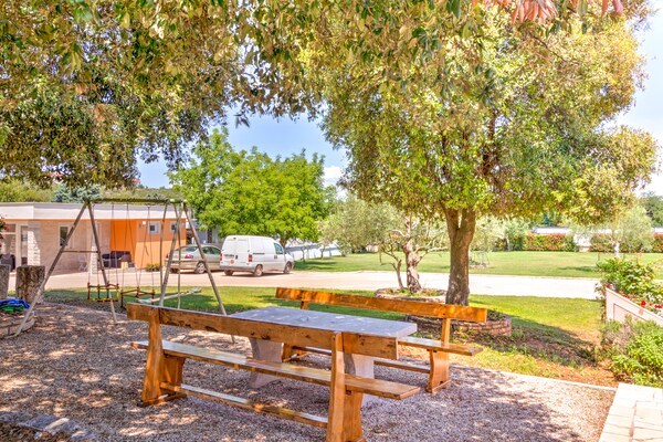 Foto van Stacaravan in Banjole bij Strand - Vakantiehuis in Banjole - GardenSummer