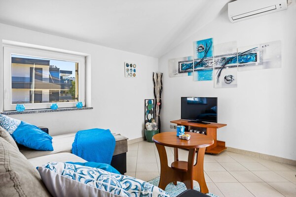 Foto van Gezinsvriendelijk appartement met uitzicht op zee - Vakantiehuis in Medulin - LivingRoom