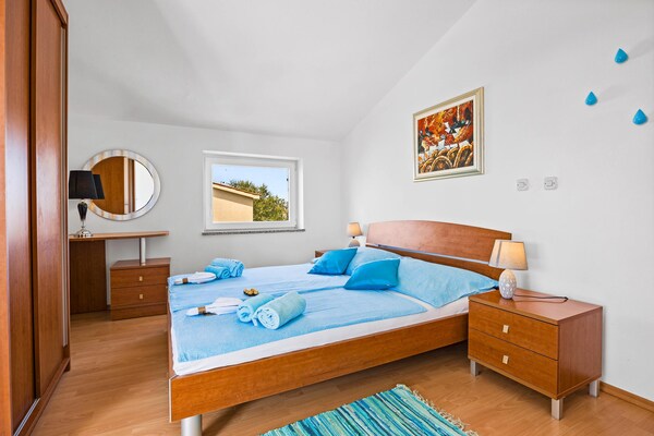 Foto van Gezinsvriendelijk appartement met uitzicht op zee - Vakantiehuis in Medulin - BedRoom