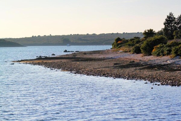 Foto van Gezinsvriendelijk appartement met uitzicht op zee - Vakantiehuis in Medulin - AreaSummer5KM