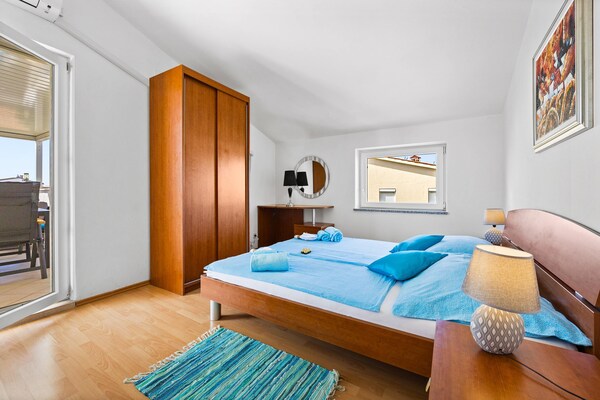 Foto van Gezinsvriendelijk appartement met uitzicht op zee - Vakantiehuis in Medulin - BedRoom