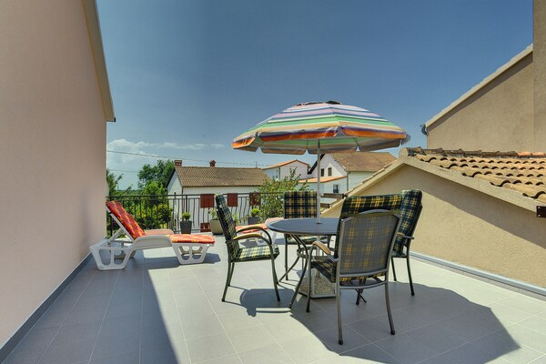 Foto van Appartement in Medulin bij de zee - Vakantiehuis in Medulin - TerraceBalcony