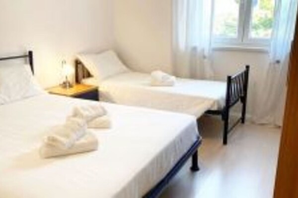 Foto van Mooi appartement met uitzicht - Vakantiehuis in Funtana - BedRoom